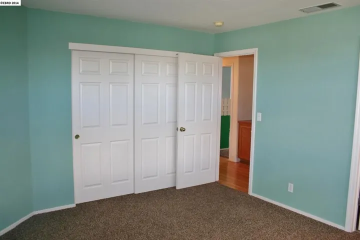 Large bedroom with it's own private bath & large closet.