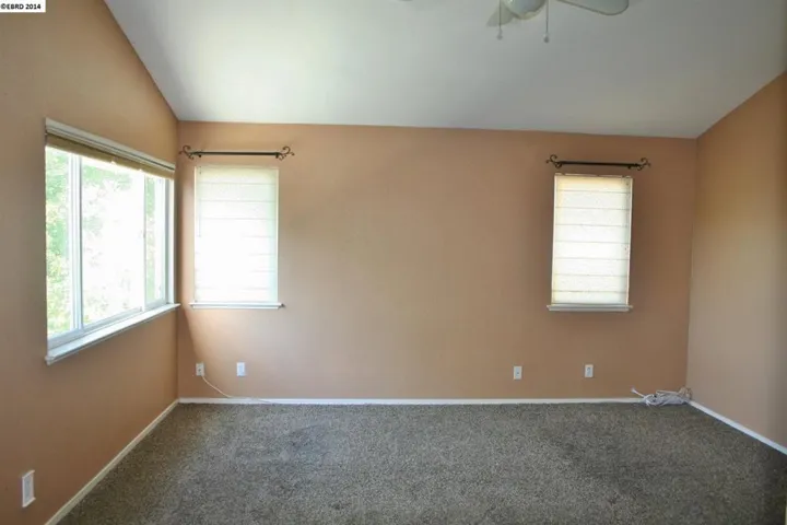 Large with vaulted ceilings.  Ceiling fan/light fixture!  View of yard!