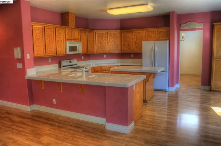 Lots of storage & workspace, including large island.