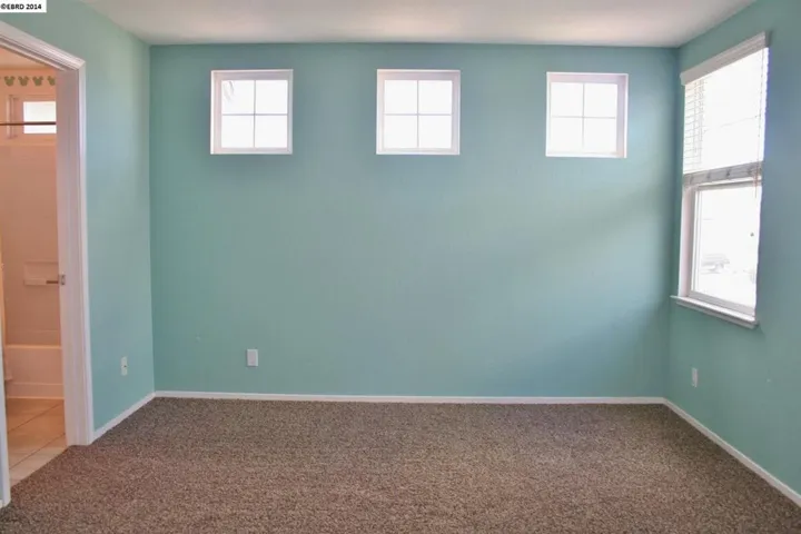 Large bedroom with it's own private bath & large closet.
