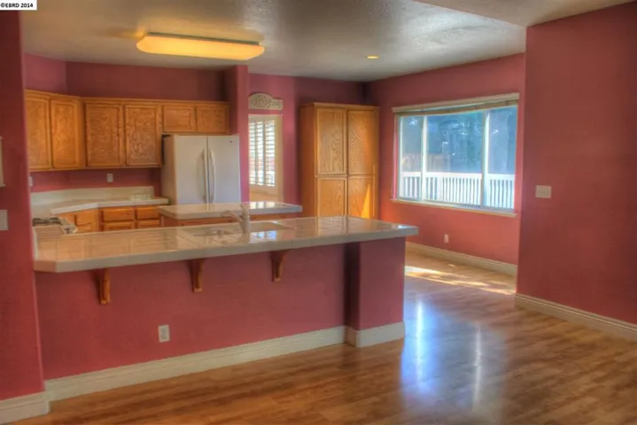 Also has an eat in area with view of yard.
