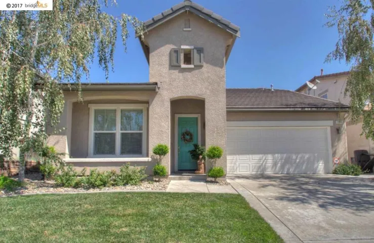 Gorgeous landscaping & very architecturally appealing!