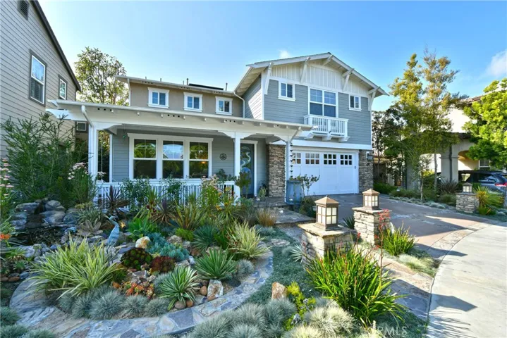Welcome Home ~~ Beautiful four bedroom 5.5 bathroom home in the Heron Pointe Community of Seal Beach.  Located at the end of the cul de sac.  And the beautiful custom made stained glass on the front door.