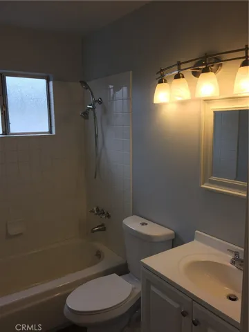 Bathroom #1. New Toilet, Vanity & Lighting.