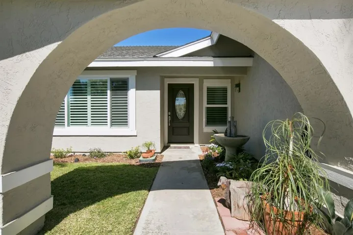 Architectural feature on front of house adds accent to the entrance area. Front door is new.