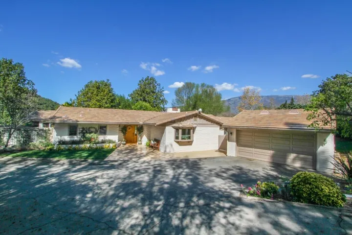 Located at the end of a 2 home driveway on 1/2 acre.
