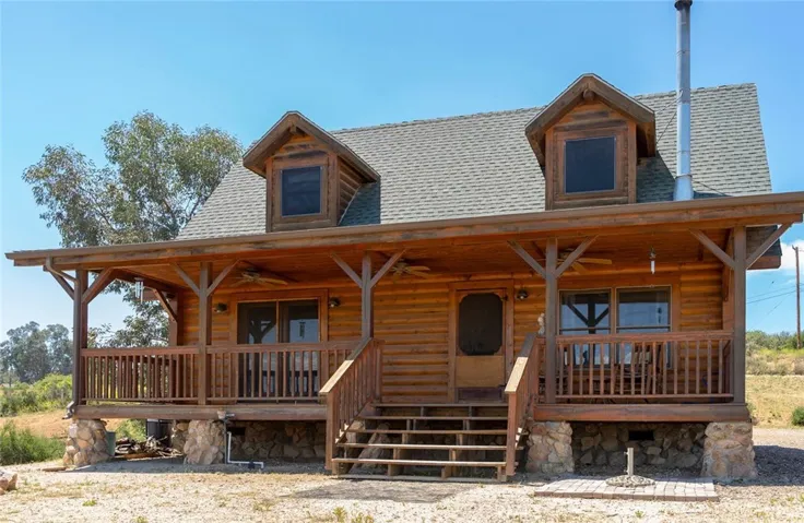 Front of the home with an expansive porch to enjoy the panoramic views.