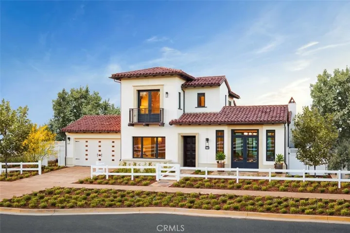 Exterior of model home with the same Adobe Ranch design as 18 Phillips Ranch Road.