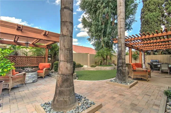 More shade trees in the backyard, but look at this custom space!