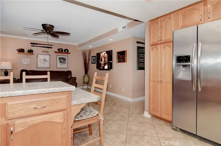 The entertaining hub: overlook the family room, breakfast counter, and backyard.