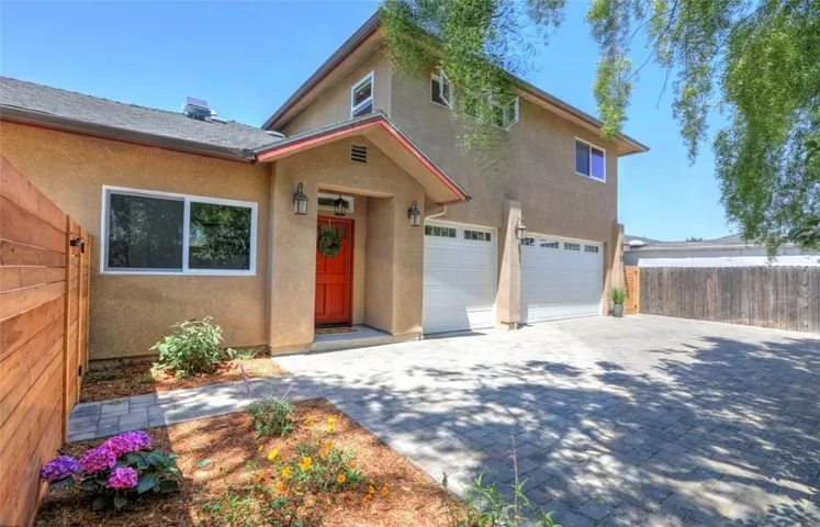 Seclusion and privacy await you in this fully remodeled, freshly landscaped home.  Brand-new cobblestone driveway and gutter system.