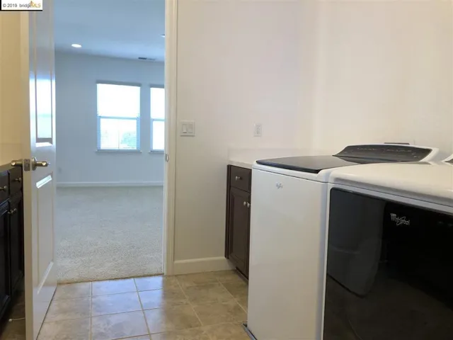 laundry room view of loft