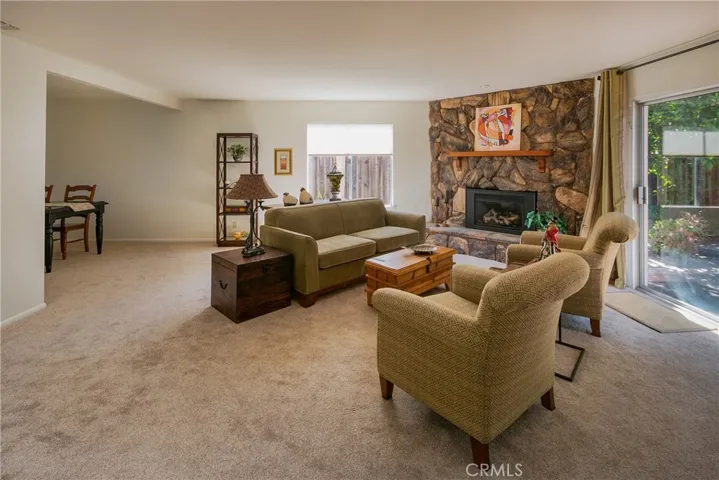 To the left is the dining room and kitchen.