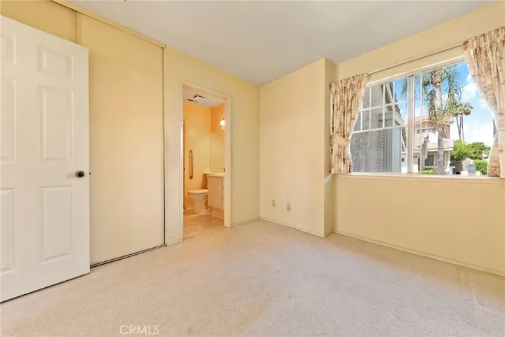 Main floor bedroom with 3/4 bath adjacent to it.