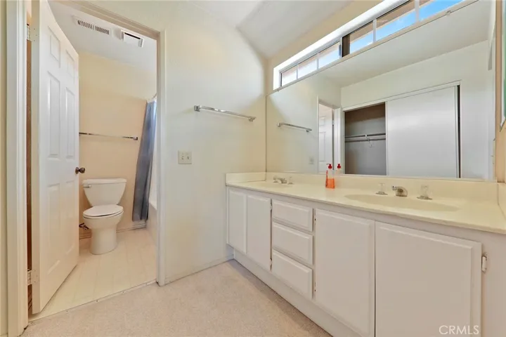Master bathroom with dual sinks.