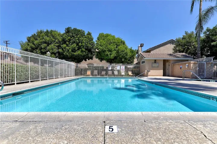 Relax and cool off by the Sparkling Blue Community Pool!