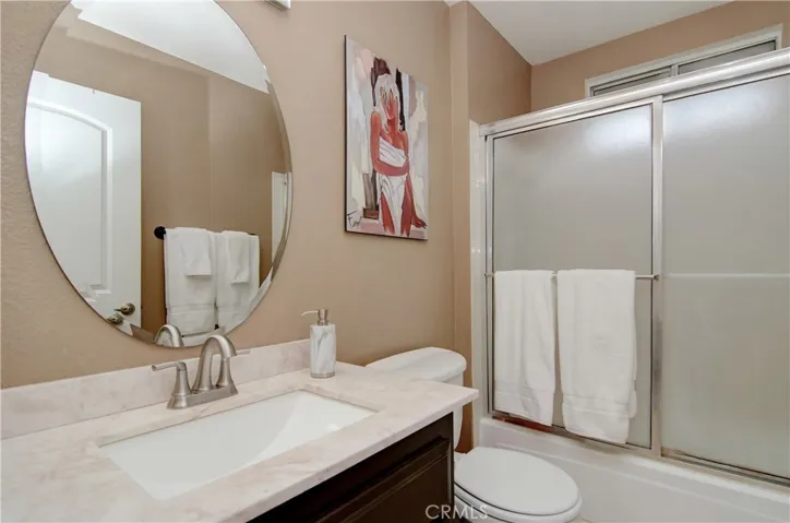 Updated bath in the second master suite...nice stone counter and fixtures.