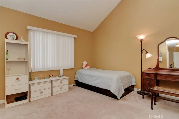 Second master suite has plenty of room for king size bed plus many furniture options...vaulted ceiling too.