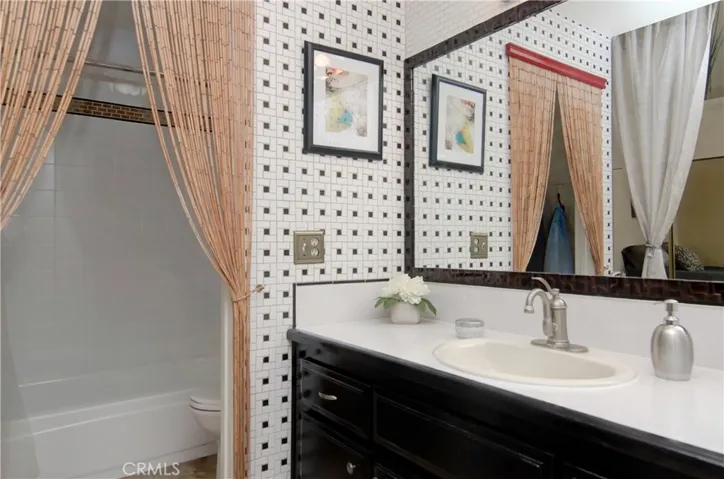 Lots of storage and counter space in this roomy vanity area.