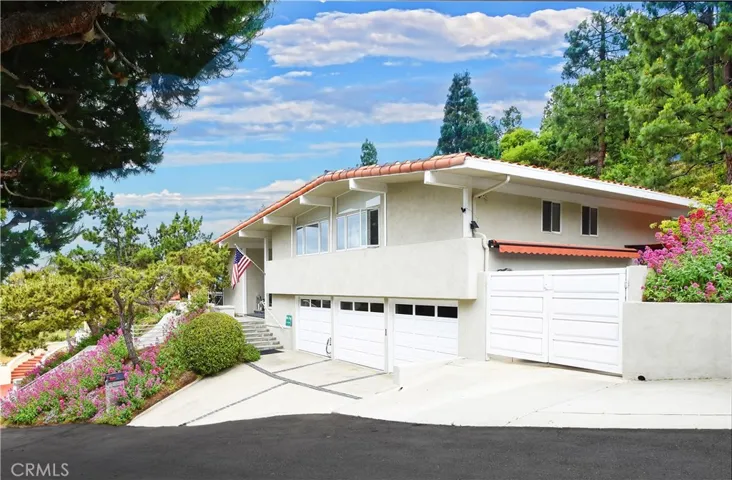 3 car garage plus gated RV/watercraft parking on side of house