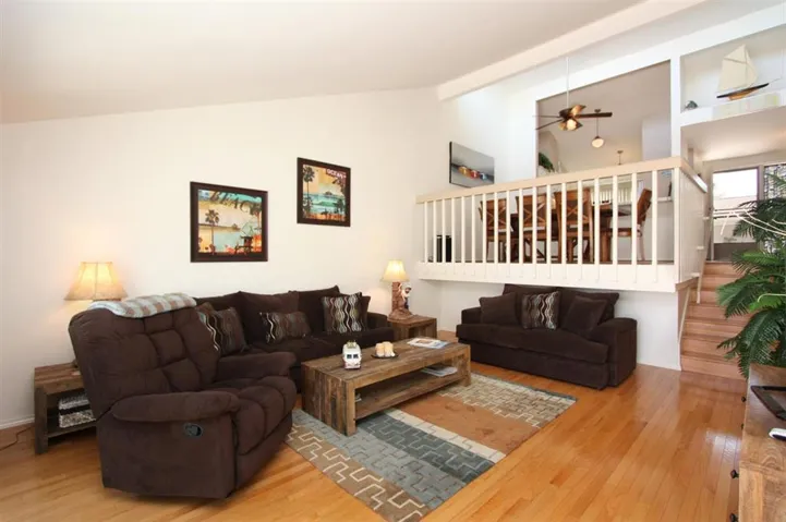 View looking from the living room toward the dining area and kitchen.