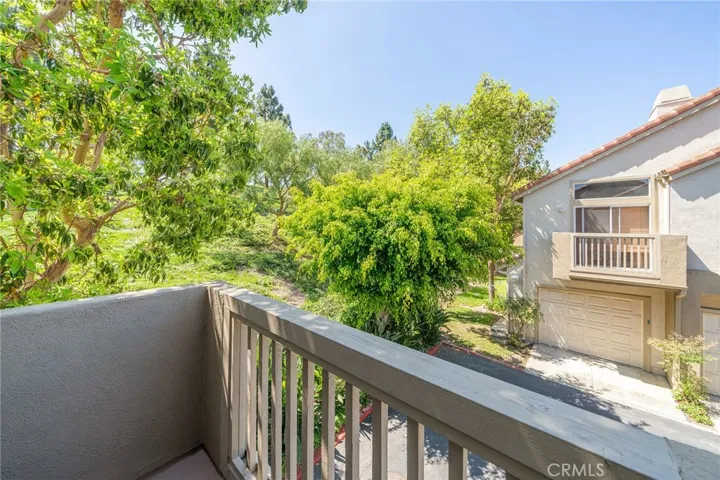 Balcony off of Bedroom with view of greenbelt