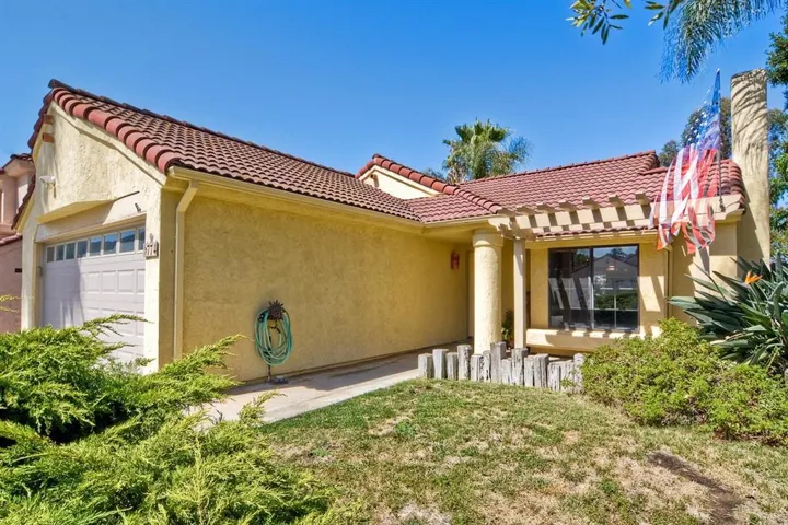 Large front yard with mature landscaping