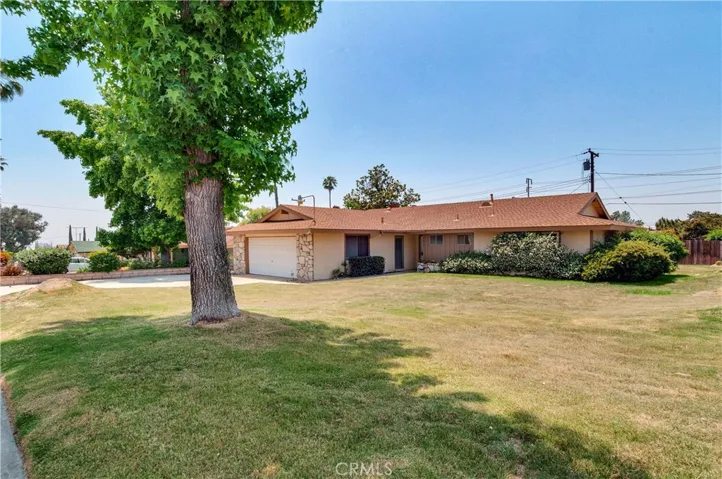 6214 Stanton Ave.  Single-story ranch style home with large lot.