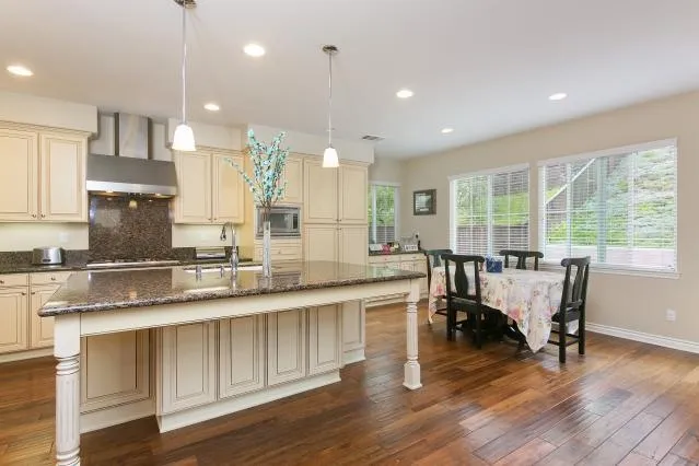 Large chef's kitchen with over sized island & breakfast bar