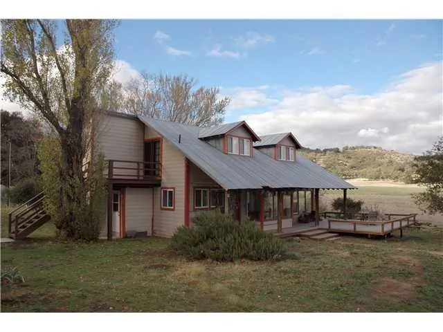 Well maintained old ranch house in wonderful country setting.