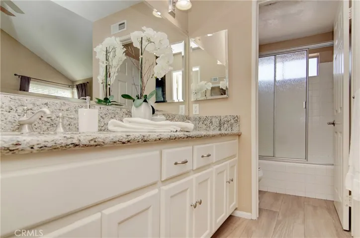 Dual Vanities and tons of storage in this Master Bath, our SECOND of three FULL BATHS!