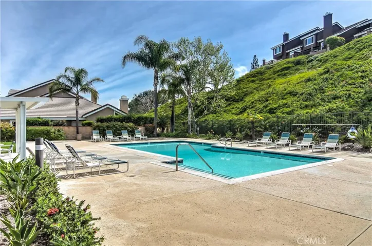 Green space is everywhere in ths ultra low density community, even at the pool!