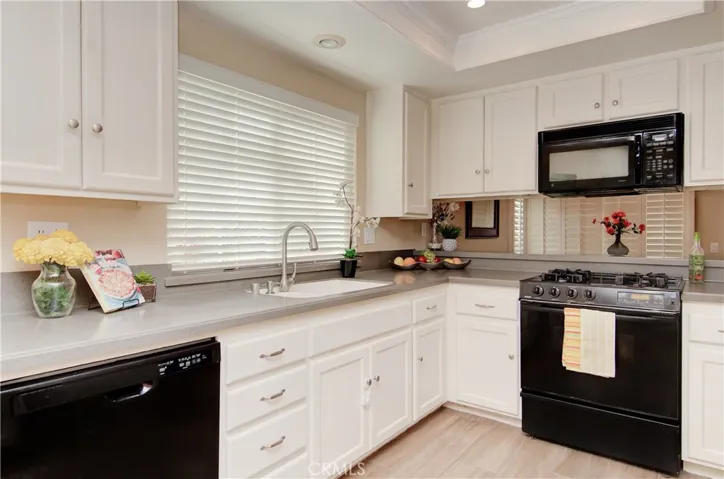 (Psst- the over-sink window looks out to your private side yard and upslope...not a wall or neighbor like most homes- another "DARE to  COMPARE" moment).