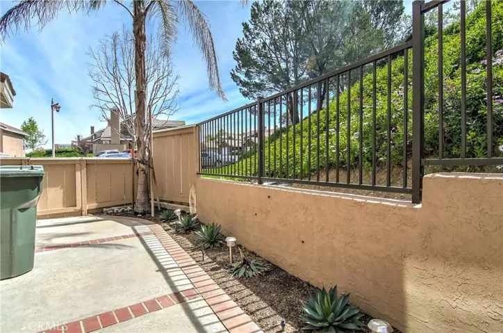 This side yard is bigger than many competitor's back yards. Easy access to the front yard for chores etc.