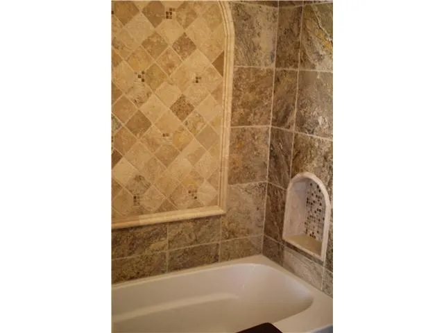 Bathrooms with tumble stone upgrades. Why go to a luxurious resort spa?