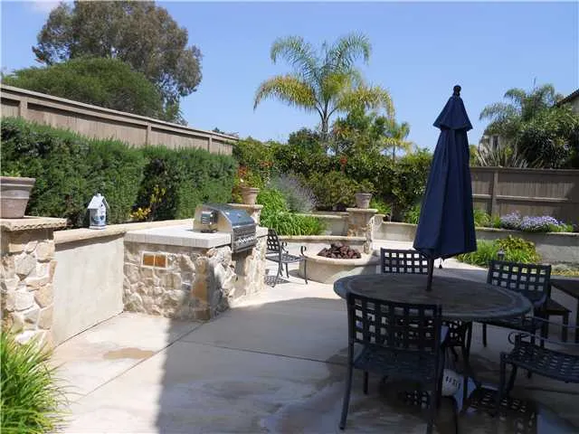 Patio with built in gas barbeque and firepit