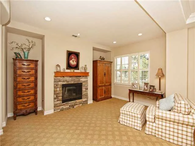 Master includes a fireplace in the sitting area