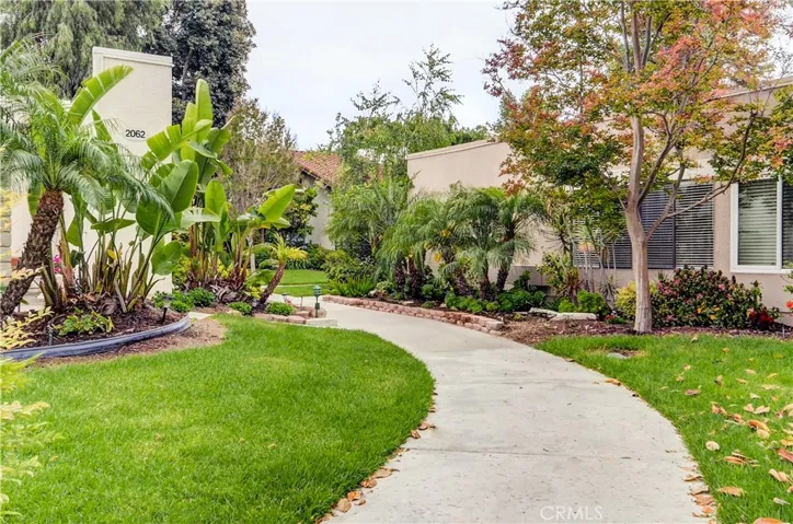 End unit location is surrounded by lush landscape and just steps to parking and laundry.