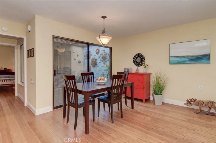 Flexible dining space is adjacent to kitchen and opens to enclosed atrium...you can entertain in style here!