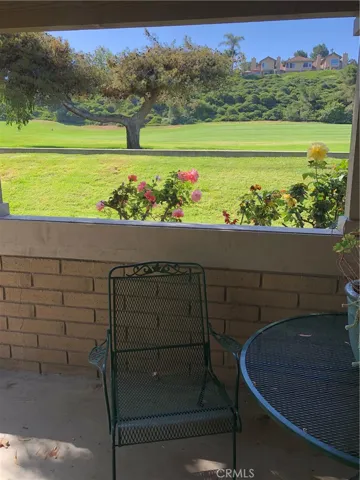 Unobstructed golf course view from the covered patio