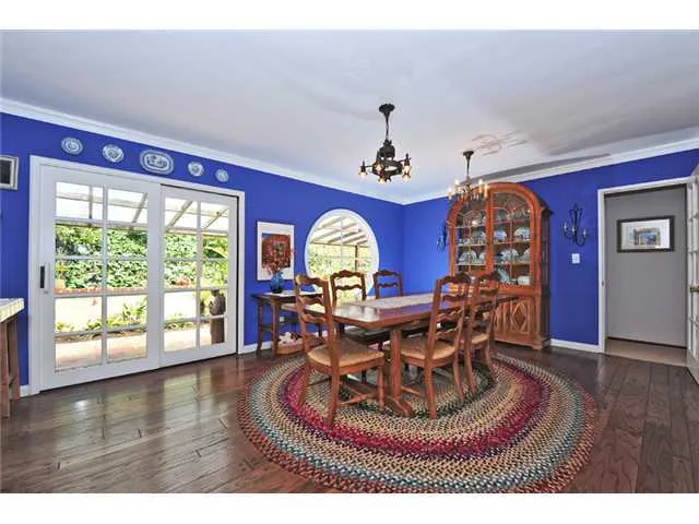 Dining room is just off kitchen and has French doors leading out the the back yard patio!