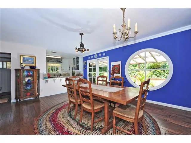 Check out the oval window! Dining area looking toward the kitchen.
