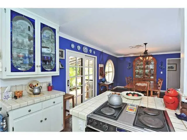 You can cook for your guests while they are sitting in the dining area.