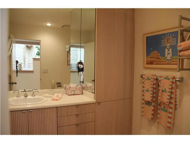 Updated guest bathroom with a tile shower.