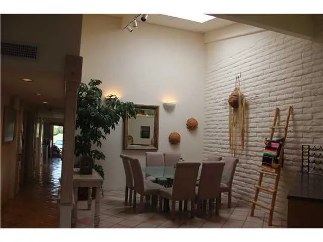 Dining area with skylight above.