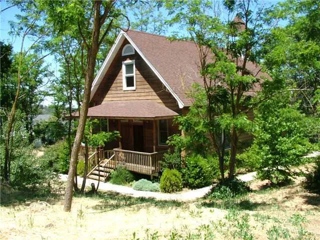 APT IS LOCATED ON THE LEFT SIDE OF THIS COVERED PORCH