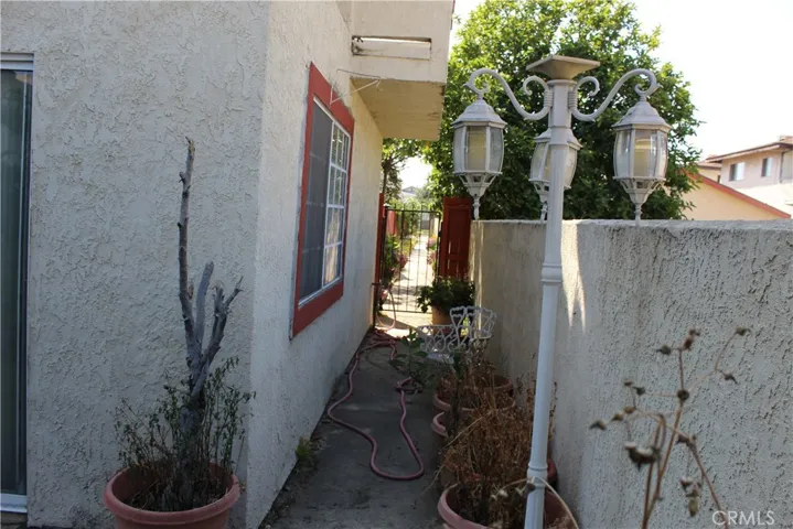 Side walk way of private patio to back yard