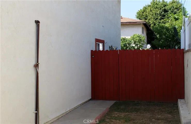 Side gate to your private patio area at rear of condo