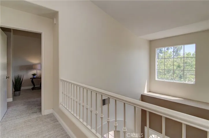 Upstairs layout offers utmost in privacy as master suite and additional bedrooms are in separate wings.