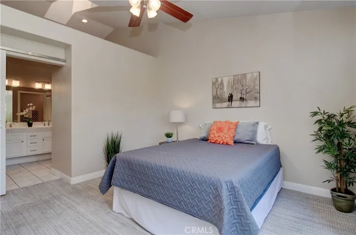 More nice details in master suite with contemporary, sliding barn door and volumes of space and light.